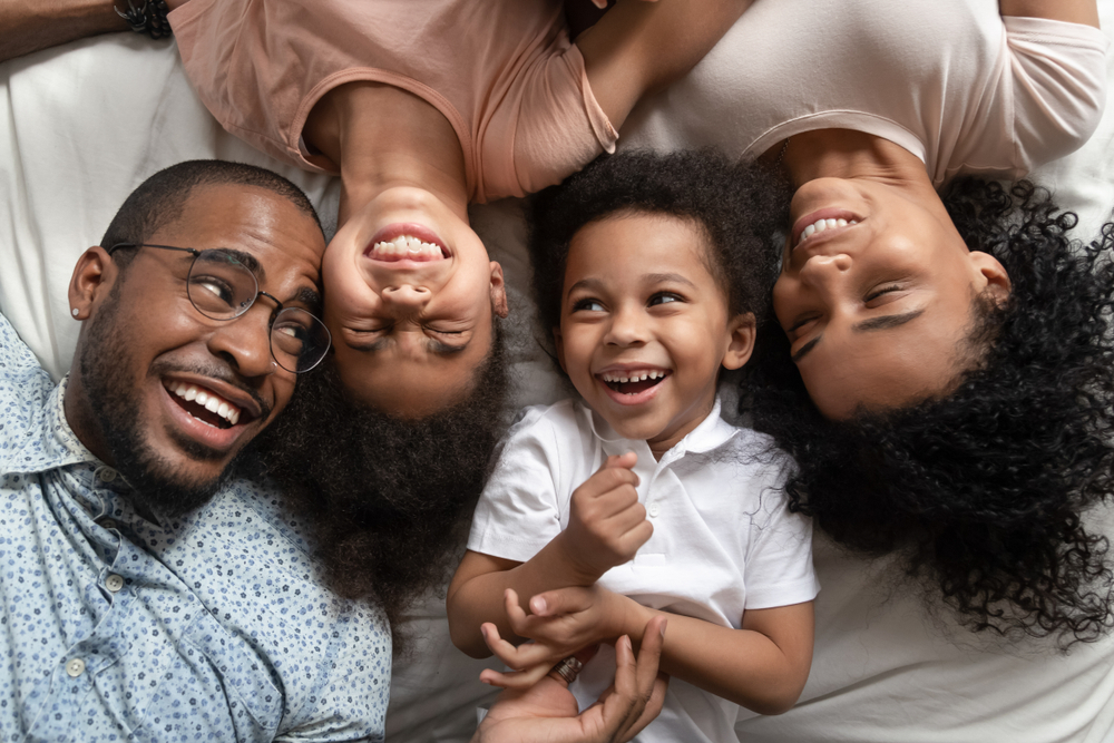 a family protects their smiles using dental sealants